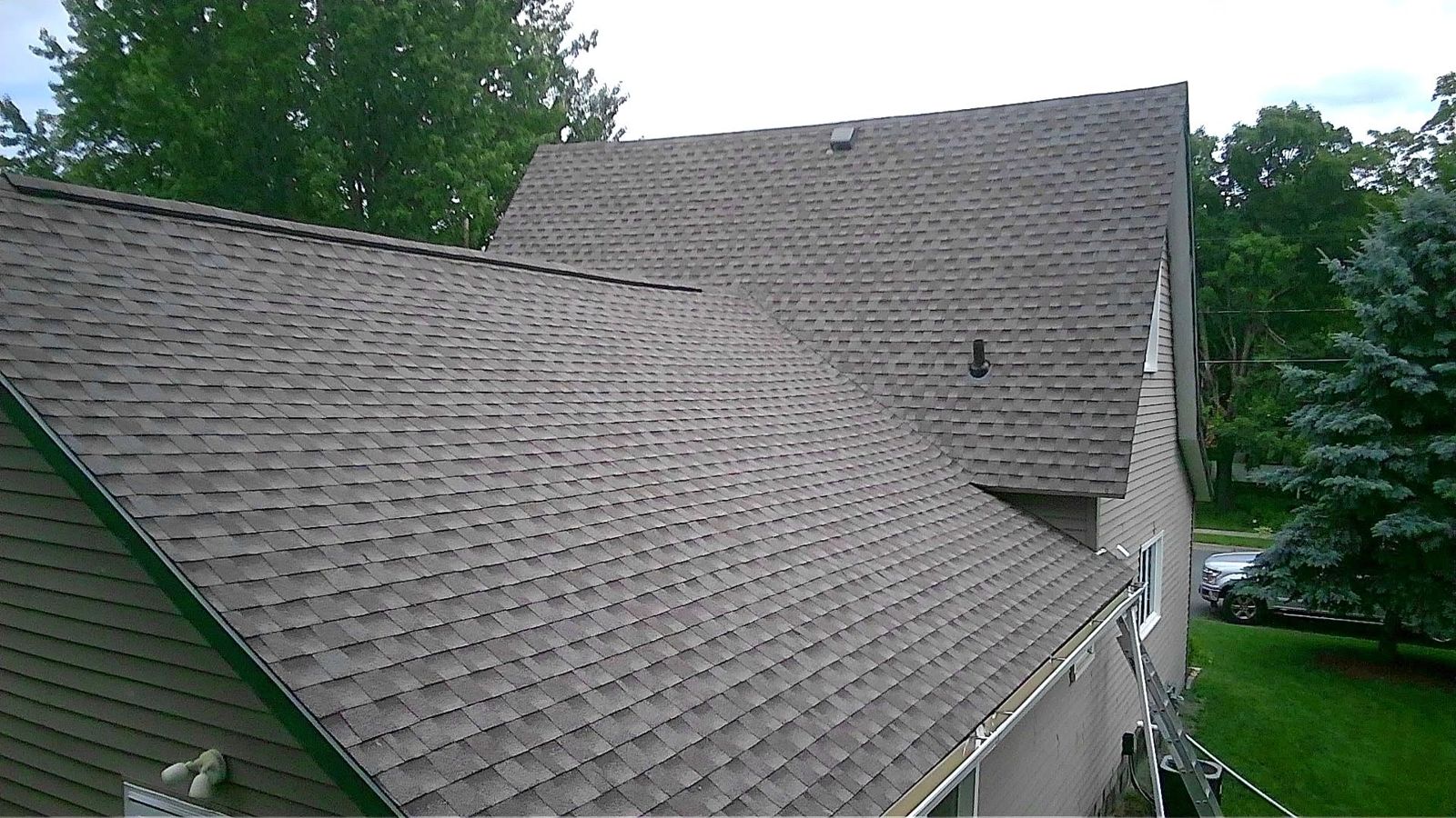 New shingles meeting the gable